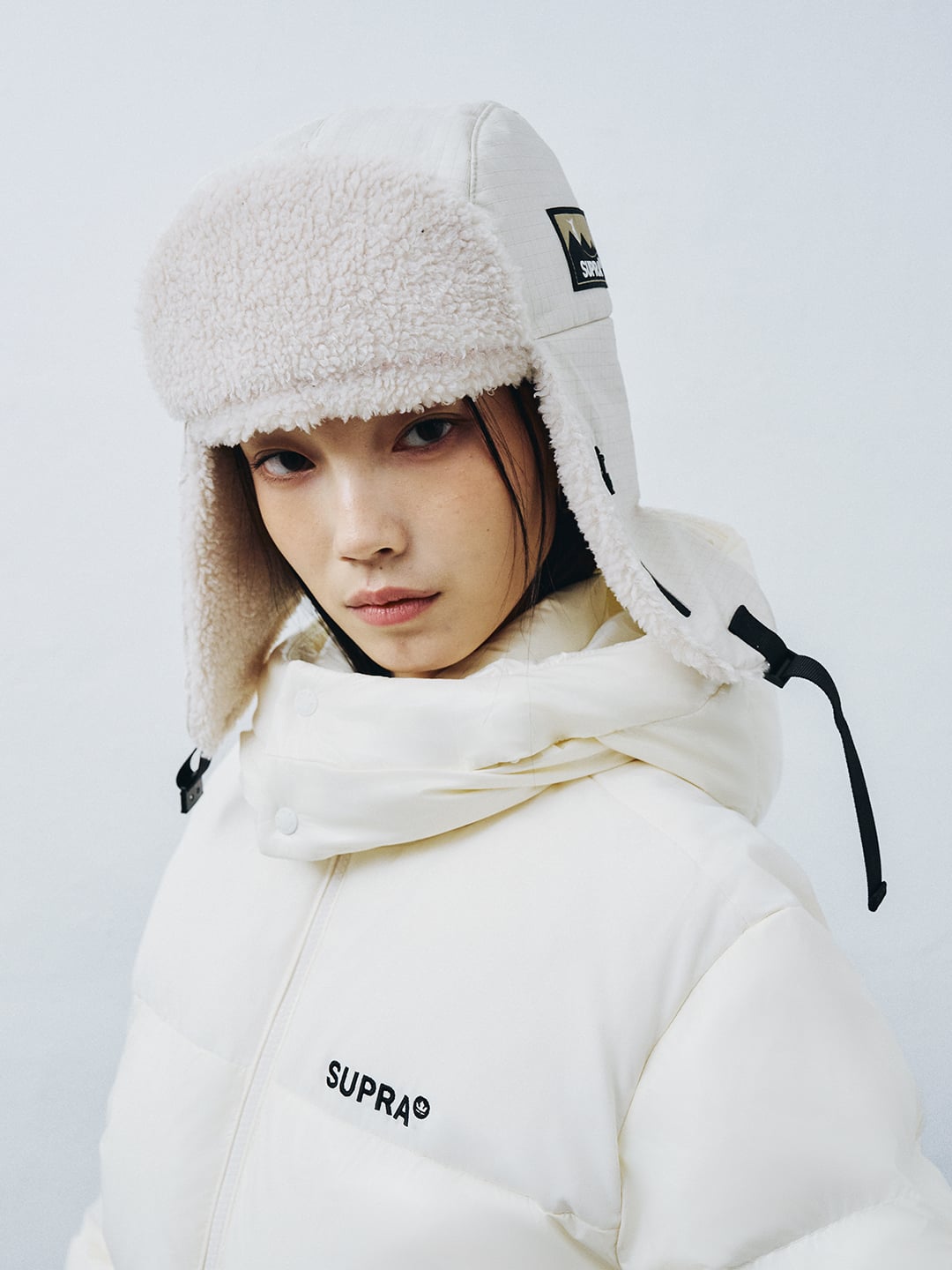 Label Point Trapper Hat