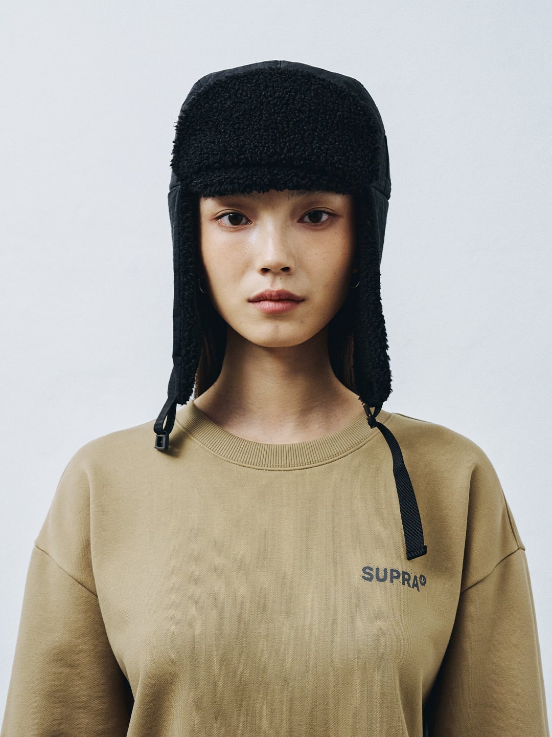 Label Point Trapper Hat