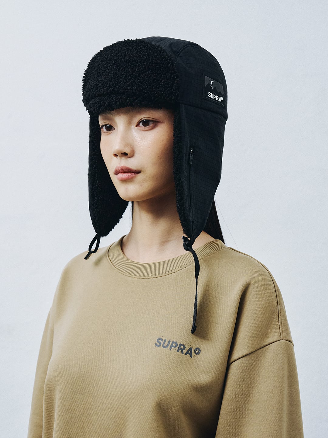 Label Point Trapper Hat