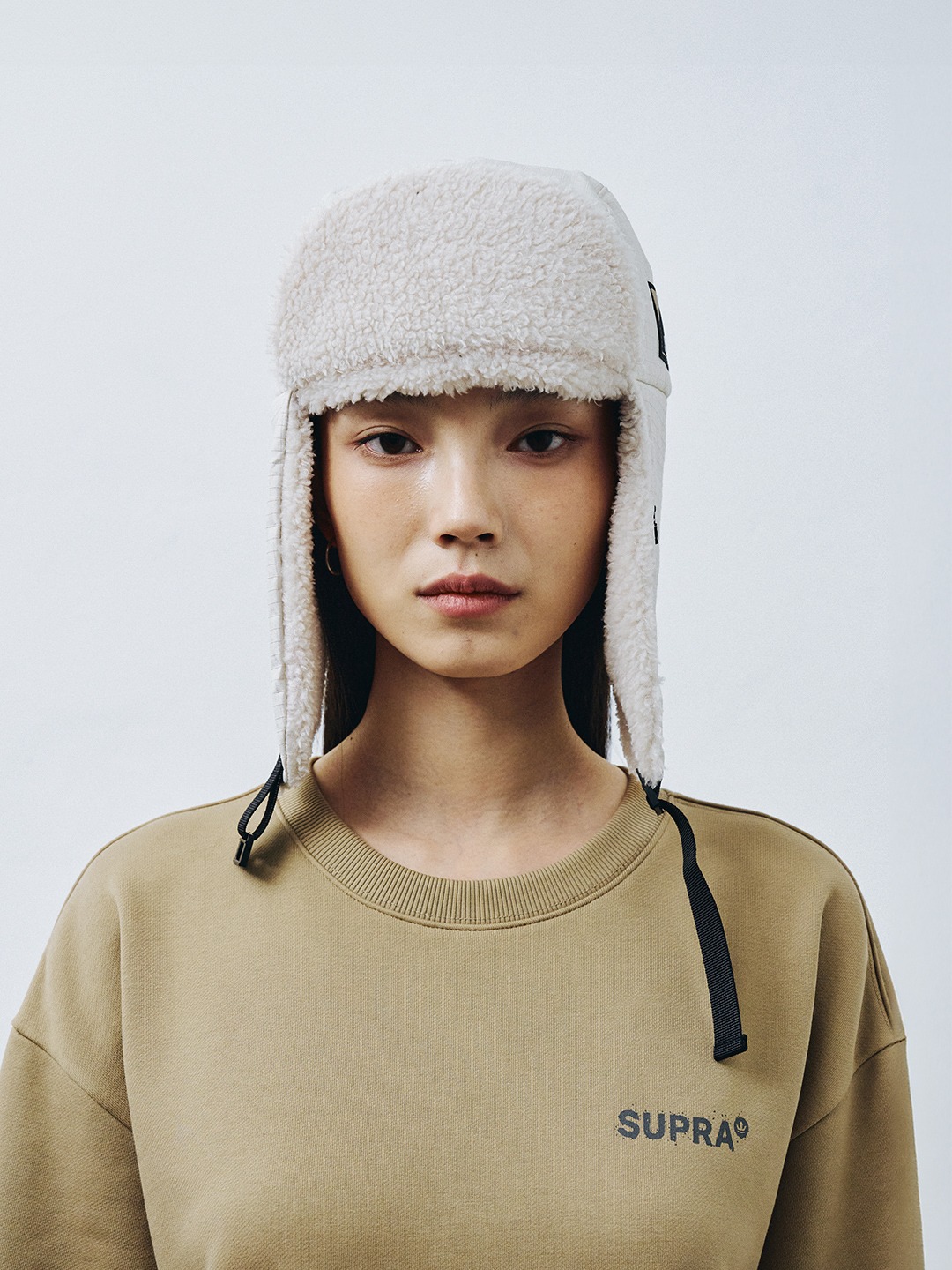 Label Point Trapper Hat